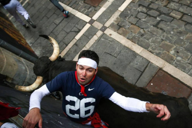Imágenes del séptimo encierro de los Sanfermines de 2018, con toros de la ganadería Jandilla.