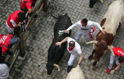 Imágenes del séptimo encierro de los Sanfermines de 2018, con toros de la ganadería Jandilla.