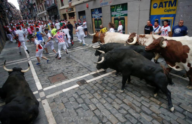 Imágenes del séptimo encierro de los Sanfermines de 2018, con toros de la ganadería Jandilla.