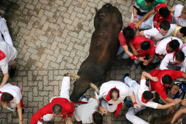 Imágenes del séptimo encierro de los Sanfermines de 2018, con toros de la ganadería Jandilla.
