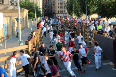 Fotos del encierro, despedida de gigantes, paellada popular y encierro infantil del último día de las fiestas de Tudela 2018, 29 de julio.