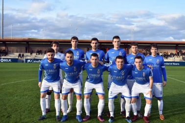 Como todos los fines de semana, el Grupo XV de la Tercera División Nacional llena los campos navarros de color y competición. El pasado jueves día seis, Osasuna Promesas y CD Itaroa Huarte adelantaron su duelo en Tajonar para aprovechar el puente de la Constitución. En un partido con escaso juego, el filial rojillo se impuso por 1 a 0 a un Itaroa Huarte que jamás bajó los brazos, pero que sucumbió por su falta de acierto en ataque y sus despistes en la zaga.