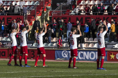 Imágenes del encuentro de la jornada 19 disputado en el Municipal de Reus y que finalizó con triunfo rojillo con un gol de Juan Villar.
