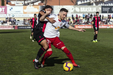 Imágenes del encuentro de la jornada 19 disputado en el Municipal de Reus y que finalizó con triunfo rojillo con un gol de Juan Villar.