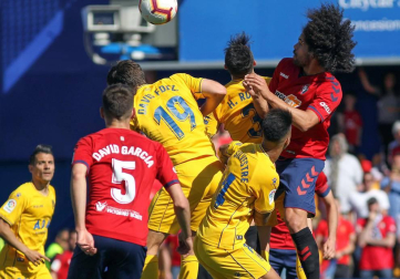Galería de imágenes del partido disputado este sábado en el estadio de Santo Domingo.