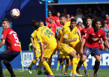 Galería de imágenes del partido disputado este sábado en el estadio de Santo Domingo.