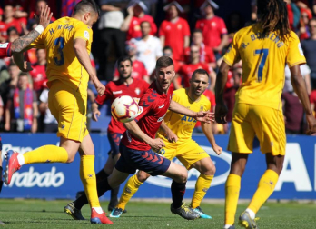 Galería de imágenes del partido disputado este sábado en el estadio de Santo Domingo.