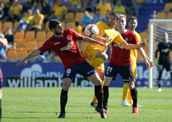 Galería de imágenes del partido disputado este sábado en el estadio de Santo Domingo.