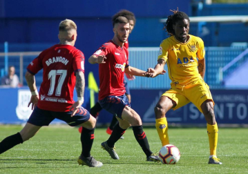 Galería de imágenes del partido disputado este sábado en el estadio de Santo Domingo.