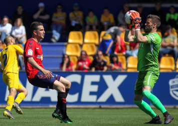 Galería de imágenes del partido disputado este sábado en el estadio de Santo Domingo.