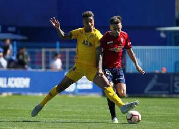 Galería de imágenes del partido disputado este sábado en el estadio de Santo Domingo.