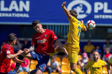 Galería de imágenes del partido disputado este sábado en el estadio de Santo Domingo.