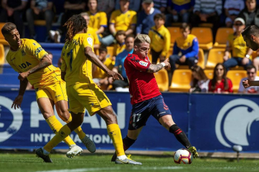 Galería de imágenes del partido disputado este sábado en el estadio de Santo Domingo.