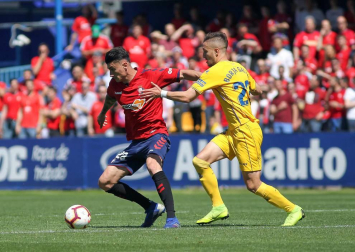 Galería de imágenes del partido disputado este sábado en el estadio de Santo Domingo.