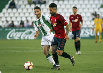Fotos de la victoria del equipo navarro en el Nuevo Arcángel que le ha dado el título de la Liga 1/2/3.