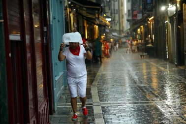 Fotos de Pamplona pasada por agua en el tercer día de Sanfermines