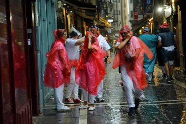 Fotos de Pamplona pasada por agua en el tercer día de Sanfermines