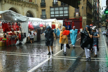 Fotos de Pamplona pasada por agua en el tercer día de Sanfermines