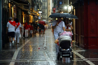 Fotos de Pamplona pasada por agua en el tercer día de Sanfermines