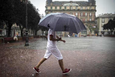 Fotos de Pamplona pasada por agua en el tercer día de Sanfermines