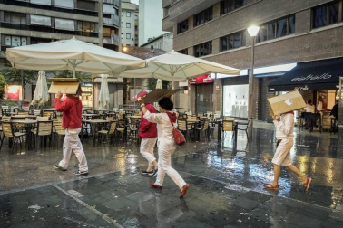 Fotos de Pamplona pasada por agua en el tercer día de Sanfermines