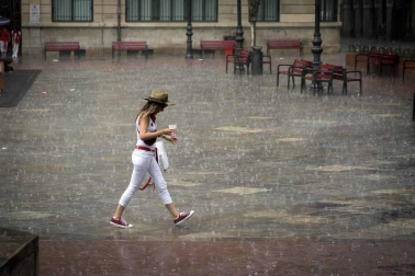 Fotos de Pamplona pasada por agua en el tercer día de Sanfermines
