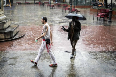 Fotos de Pamplona pasada por agua en el tercer día de Sanfermines