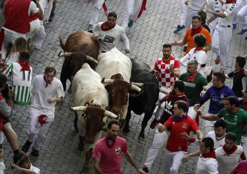 Imágenes del sexto encierro de los sanfermines 2019 protagonizado por toros de Núñez del Cuvillo.