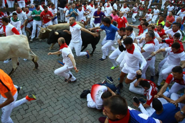Imágenes del sexto encierro de los sanfermines 2019 protagonizado por toros de Núñez del Cuvillo.