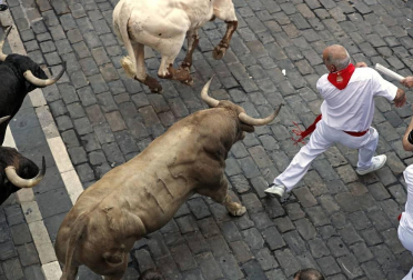 Imágenes del sexto encierro de los sanfermines 2019 protagonizado por toros de Núñez del Cuvillo.