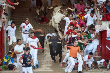 Imágenes del sexto encierro de los sanfermines 2019 protagonizado por toros de Núñez del Cuvillo.