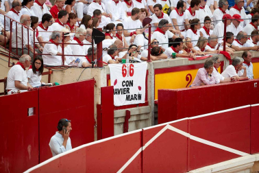Público asistente a la Plaza de Toros de Pamplona durante la séptima corrida de la Feria del Toro 2019 con la ganadería de La Palmosilla para los diestros José Garrido, Luis David Adame y Javier Marín