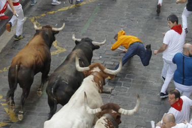 Imágenes del séptimo encierro de los Sanfermines 2019 protagonizado por toros de La Palmosilla.
