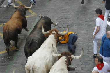 Imágenes del séptimo encierro de los Sanfermines 2019 protagonizado por toros de La Palmosilla.