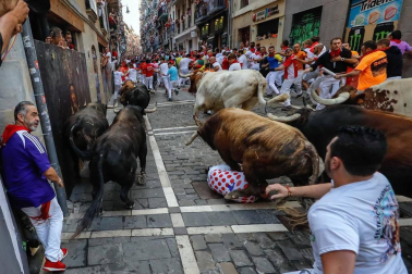 Imágenes del séptimo encierro de los Sanfermines 2019 protagonizado por toros de La Palmosilla.