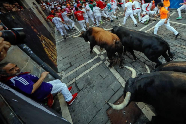 Imágenes del séptimo encierro de los Sanfermines 2019 protagonizado por toros de La Palmosilla.