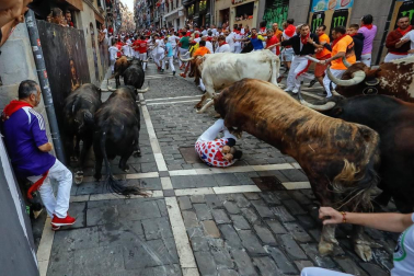 Imágenes del séptimo encierro de los Sanfermines 2019 protagonizado por toros de La Palmosilla.