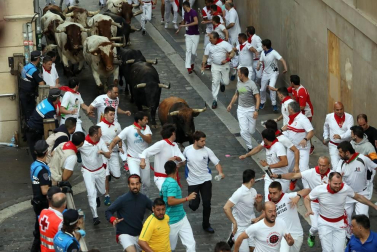 Imágenes del séptimo encierro de los Sanfermines 2019 protagonizado por toros de La Palmosilla.
