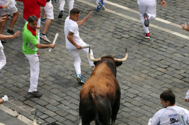Imágenes del séptimo encierro de los Sanfermines 2019 protagonizado por toros de La Palmosilla.