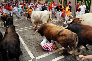 Imágenes del séptimo encierro de los Sanfermines 2019 protagonizado por toros de La Palmosilla.