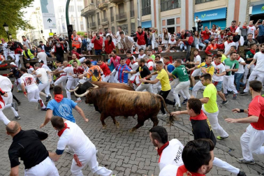 Imágenes del séptimo encierro de los Sanfermines 2019 protagonizado por toros de La Palmosilla.
