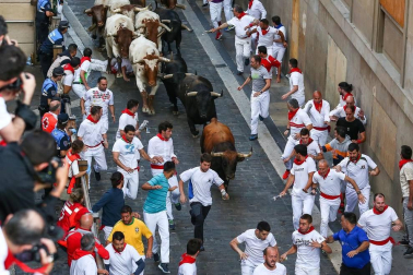 Imágenes del séptimo encierro de los Sanfermines 2019 protagonizado por toros de La Palmosilla.