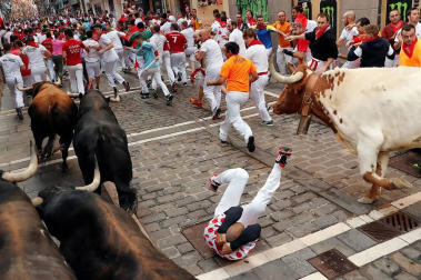 Imágenes del séptimo encierro de los Sanfermines 2019 protagonizado por toros de La Palmosilla.