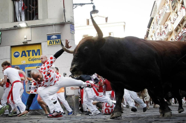 Imágenes del séptimo encierro de los Sanfermines 2019 protagonizado por toros de La Palmosilla.