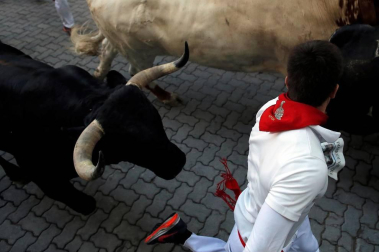 Imágenes del séptimo encierro de los Sanfermines 2019 protagonizado por toros de La Palmosilla.