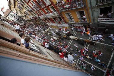 Imágenes del séptimo encierro de los Sanfermines 2019 protagonizado por toros de La Palmosilla.