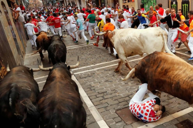 Imágenes del séptimo encierro de los Sanfermines 2019 protagonizado por toros de La Palmosilla.