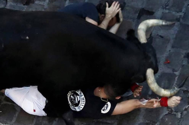 Fotos de los mejores momentos de los encierros de San Fermín 2019