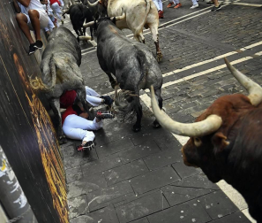 Fotos de los mejores momentos de los encierros de San Fermín 2019