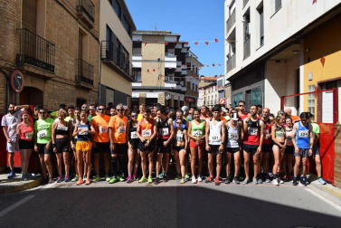 Participantes en la carrera popular disputada este domingo 11 de agosto.,